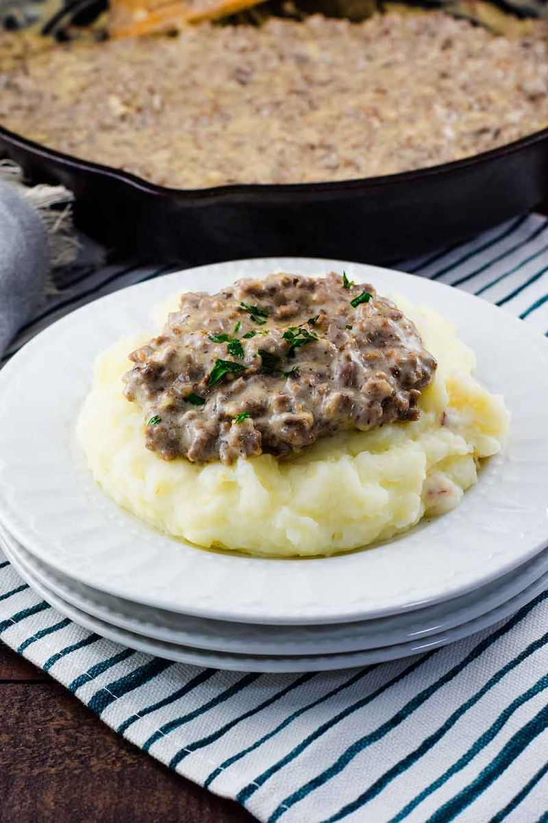 Hamburger Gravy over Mashed Potatoes