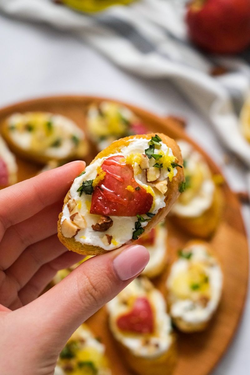 Honey-Whipped Ricotta Crostini with Peas and Prosciutto