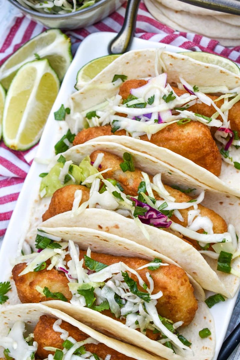 Shredded Cabbage Dumped on Tacos as Filler