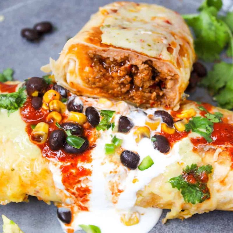 Chimichangas Drenched in Cheese Sauce