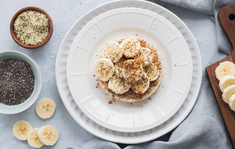 Almond Butter on Rice Cakes with Hemp Seeds