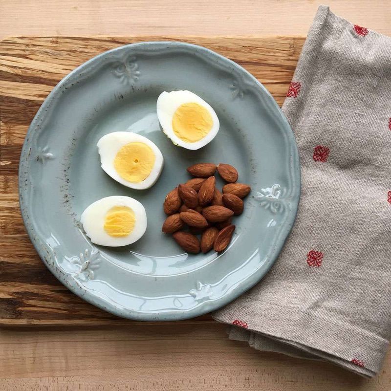 Hard-Boiled Eggs with a Handful of Berries and Almonds