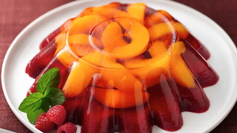 Fruit Flavored Jell-O Mold with Canned Peaches