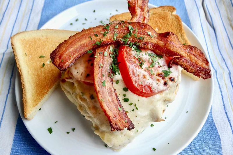 Kentucky – Open-Faced Turkey and Egg Sandwich with Bacon and Mornay Sauce