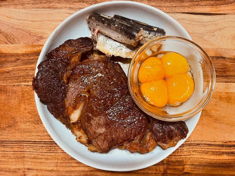 Ribeye with Raw Egg Yolks on Top