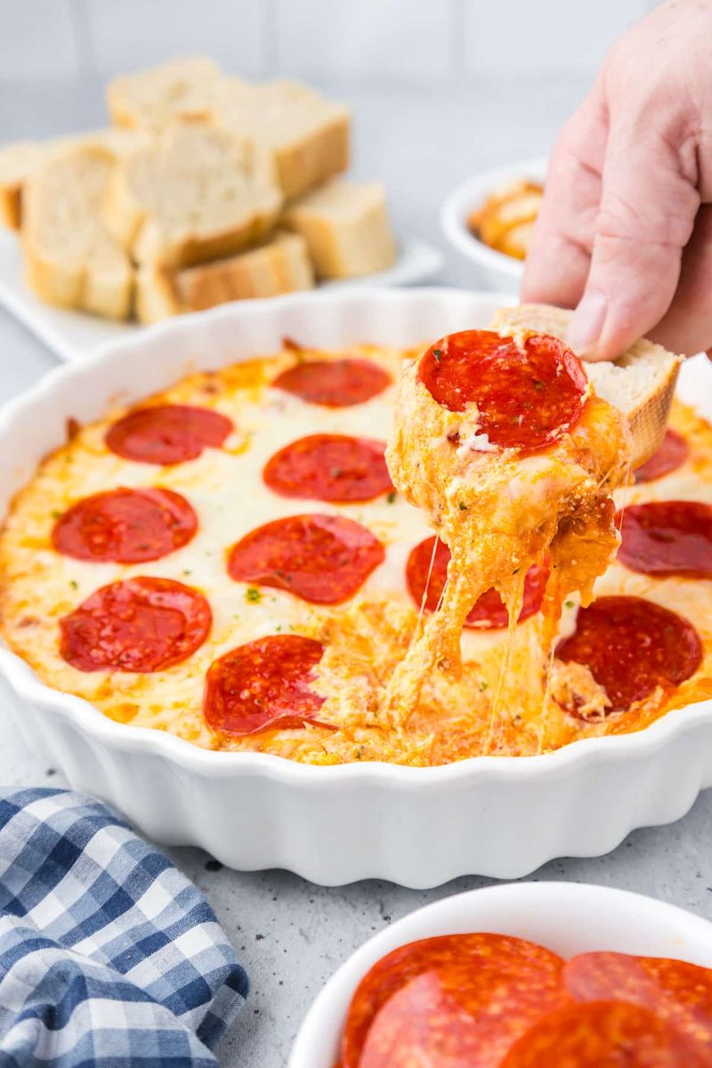 Cheesy Pizza Dip with Toasted Bread Rounds