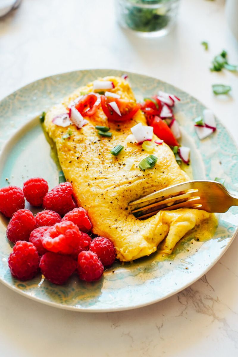 Savory Veggie Omelet with a Side of Fruit