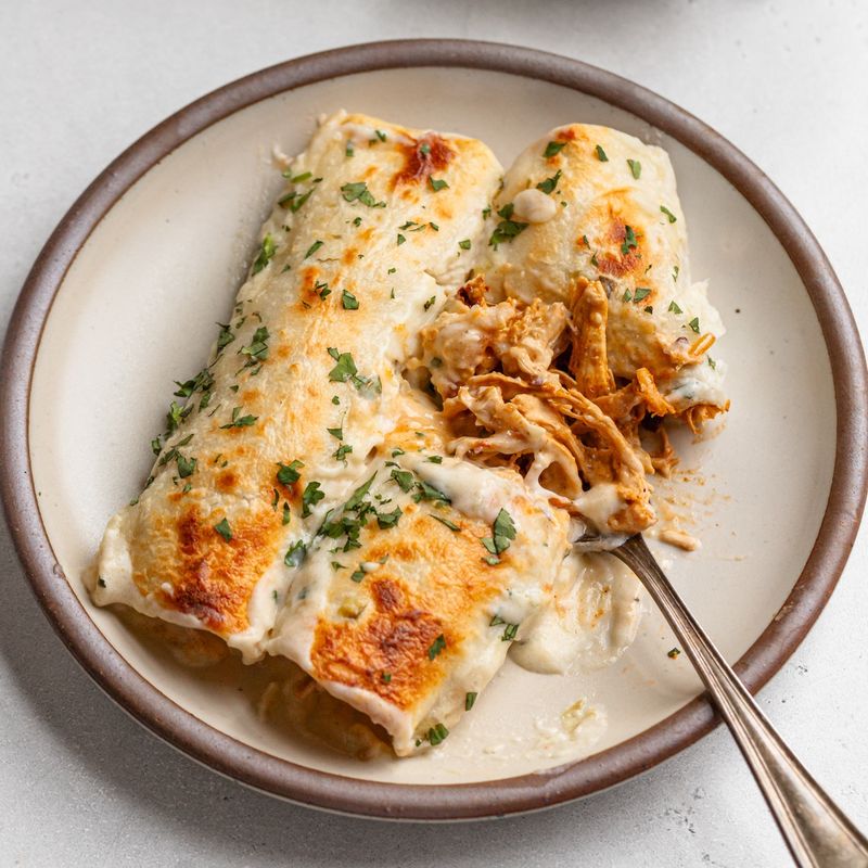 Enchiladas Smothered in Processed Cheese Sauce