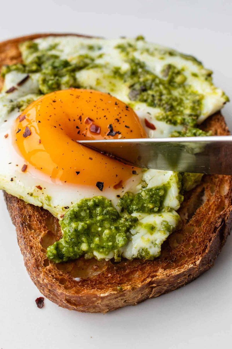 Pesto Egg Toasts with Mixed Greens
