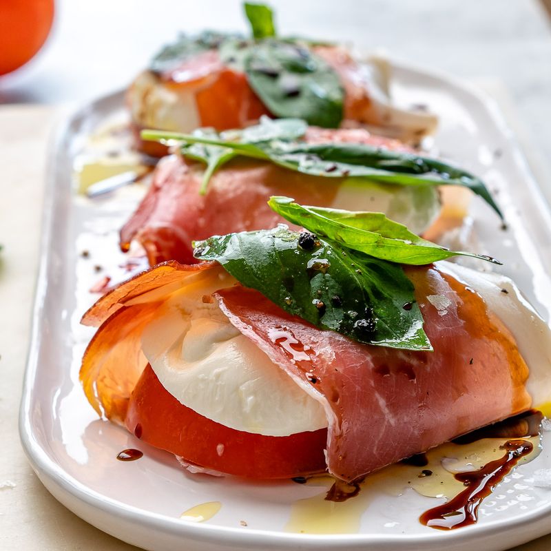 Prosciutto-Wrapped Mozzarella with Vine Ripe Tomatoes