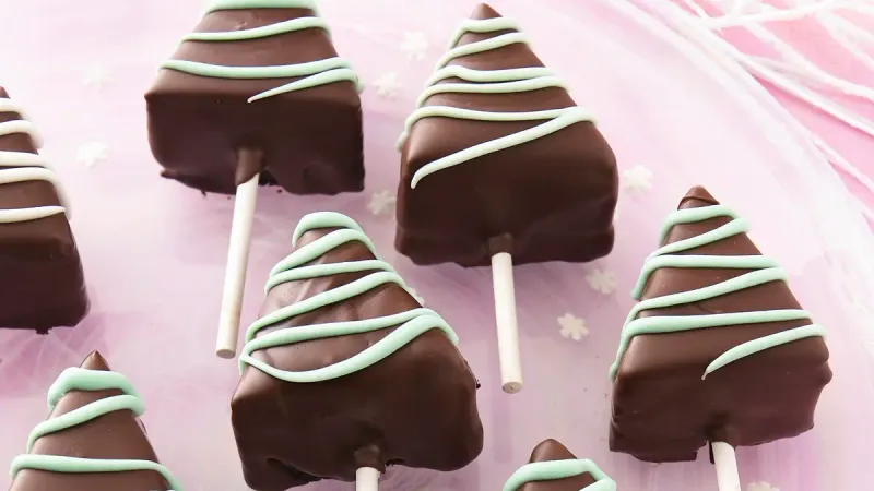 Chocolate-Covered Cheesecake Slices on a Stick