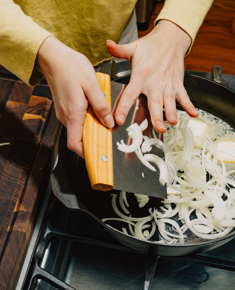 Use a bench scraper to transfer chopped ingredients
