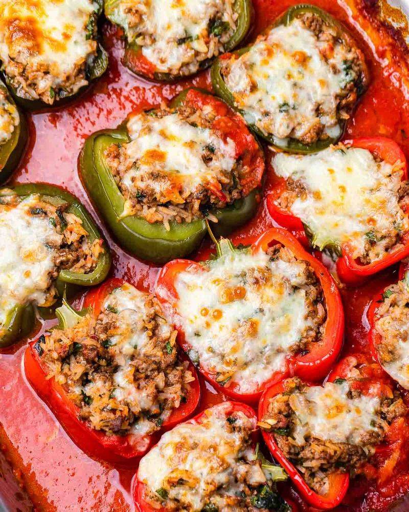 Stuffed Bell Peppers Roasted in Tomato Sauce