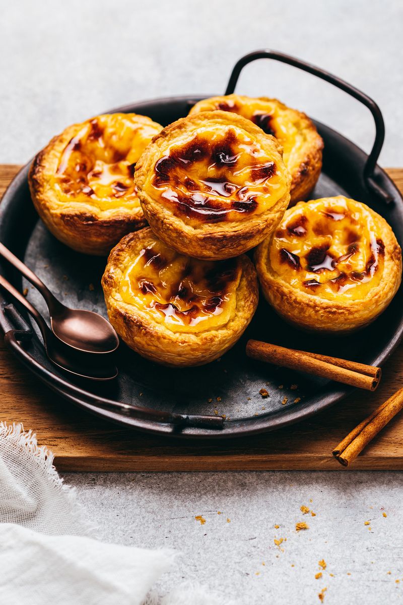 Pastel de Nata – Portugal (Chains like Manteigaria and takeaway bakeries)