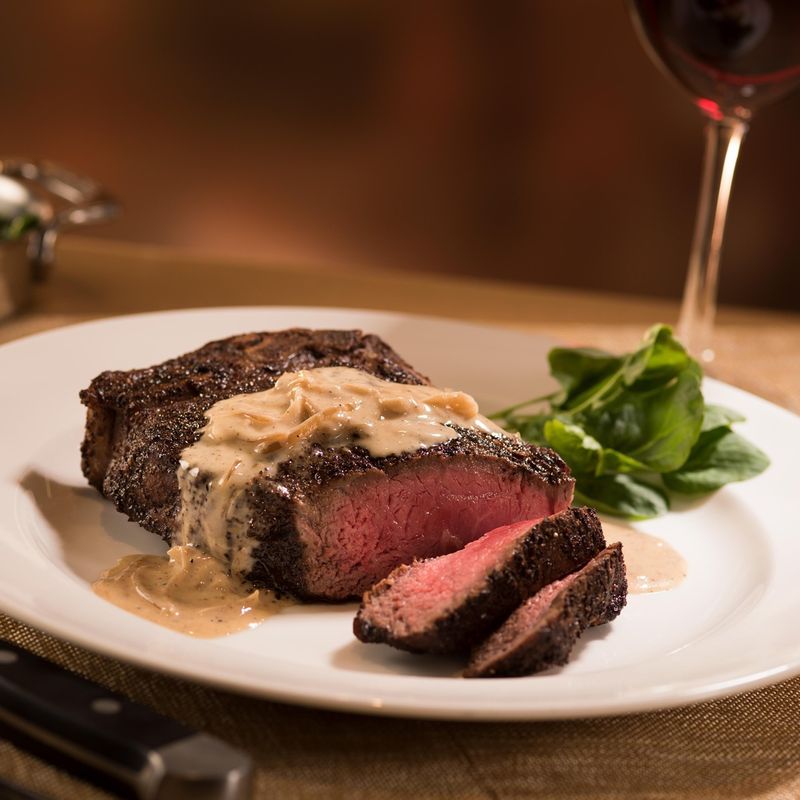 Bone-In Kona Crusted NY Strip with Shallot Butter