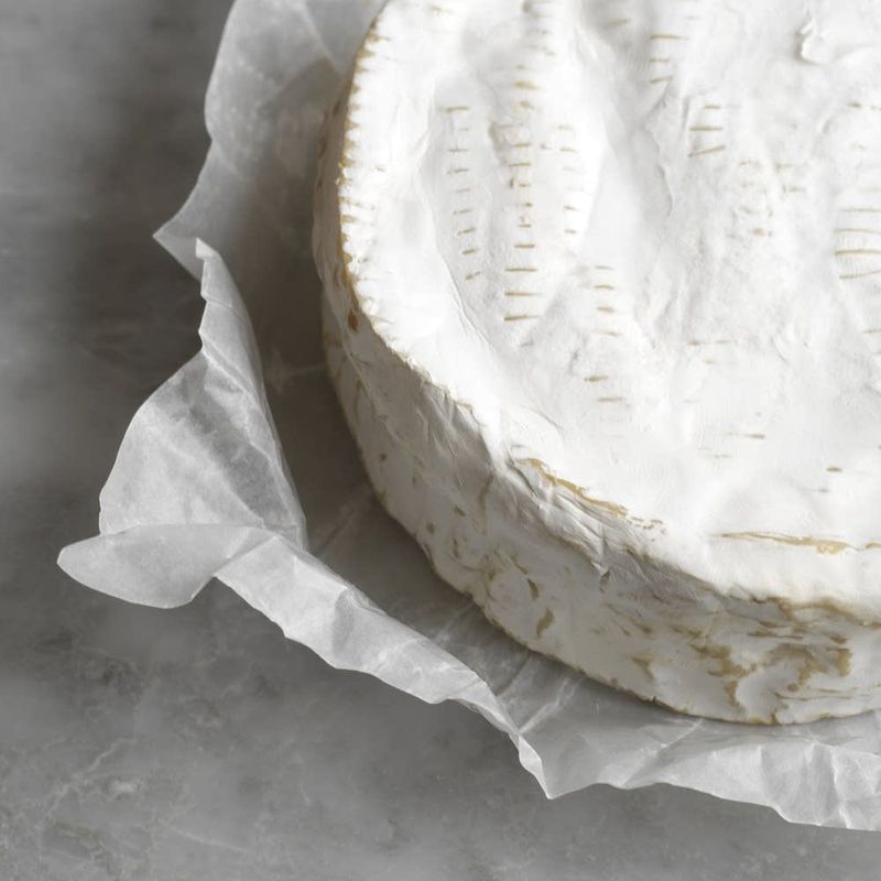 Wrap cheese in wax paper, not plastic