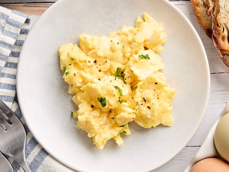 Add a Splash of Milk or Cream to Scrambled Eggs