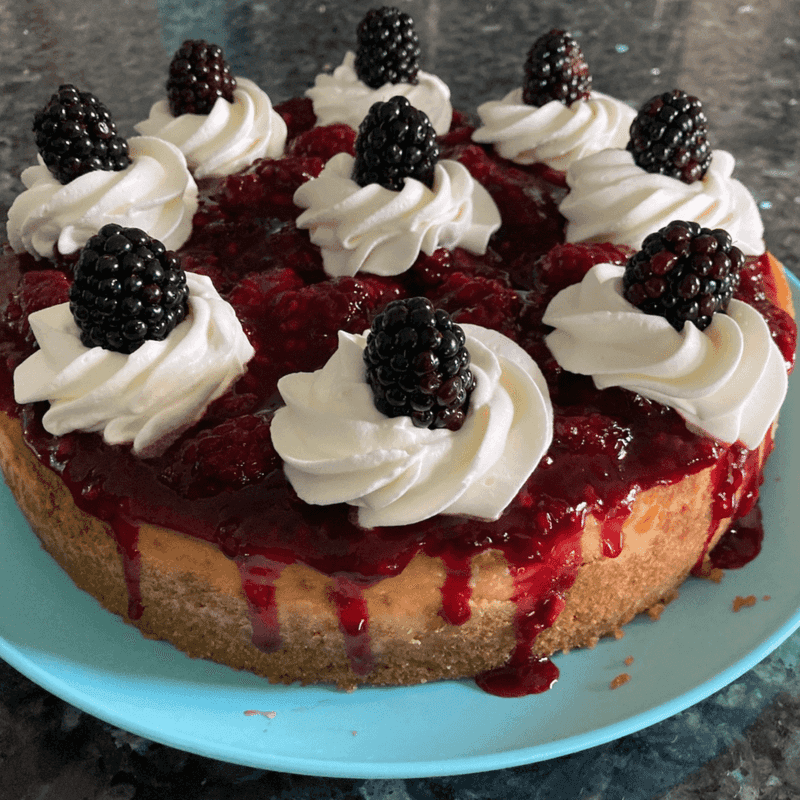Boysenberries Swirled into Creamy Cheesecake